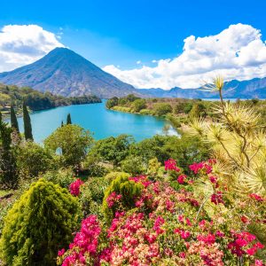 Beautiful bay of Lake Atitlan with view to Volcano San Pedro  in highlands of Guatemala, Central America