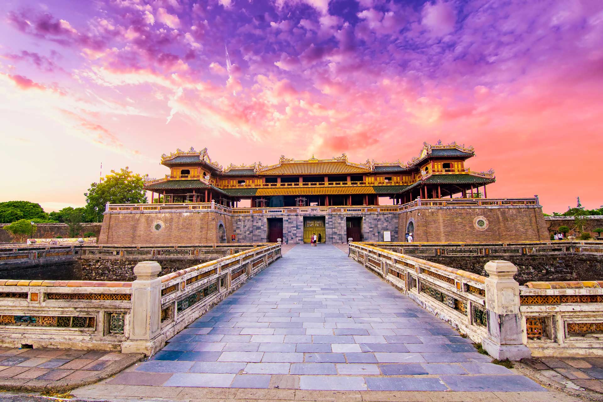 Wonderful view of the “ Meridian Gate Hue “ to the Imperial City with the Purple Forbidden City within the Citadel in Hue, Vietnam. Imperial Royal Palace of Nguyen dynasty in Hue. Hue is a popular